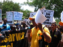 Protestors carrying placards during the demonstration in Gaborone